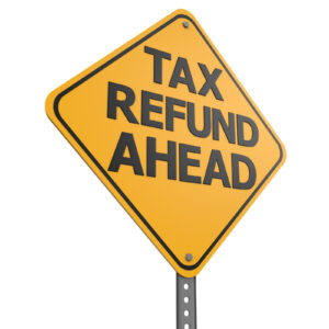 Rendered road sign with text "Tax Refund Ahead"